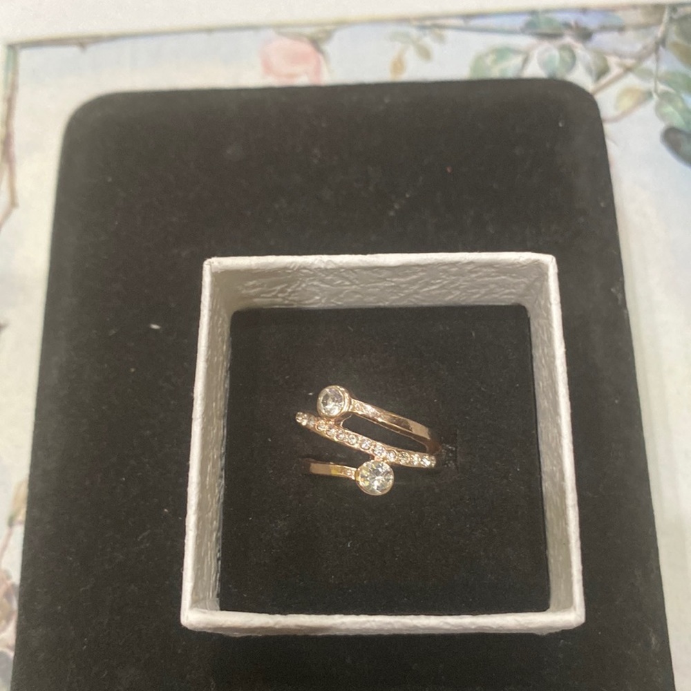 Gold plated ring with crystals.